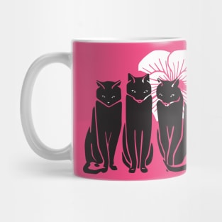 Three black cats Mug